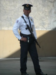 A typical Security Guard in the Philippines - they are stationed everywhere